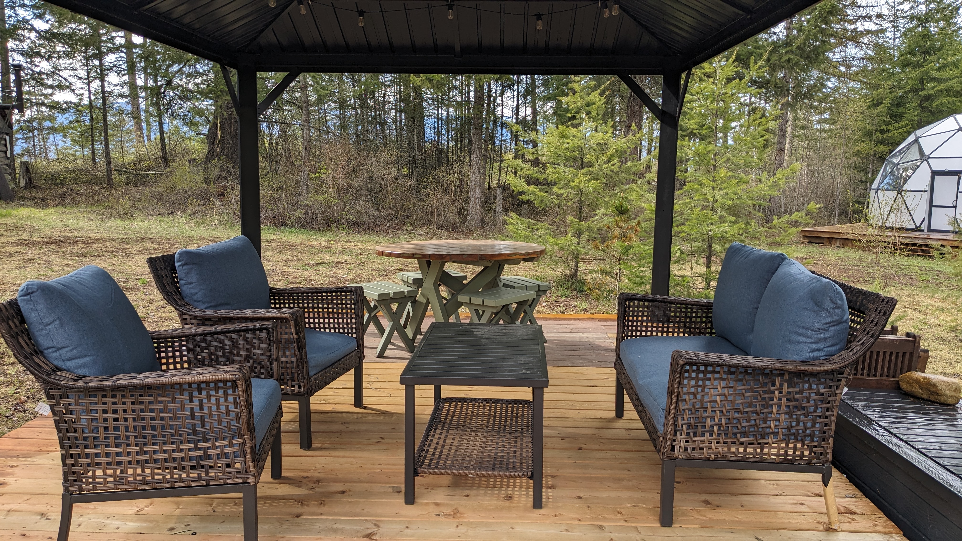 Gazebo with comfortable patio furniture